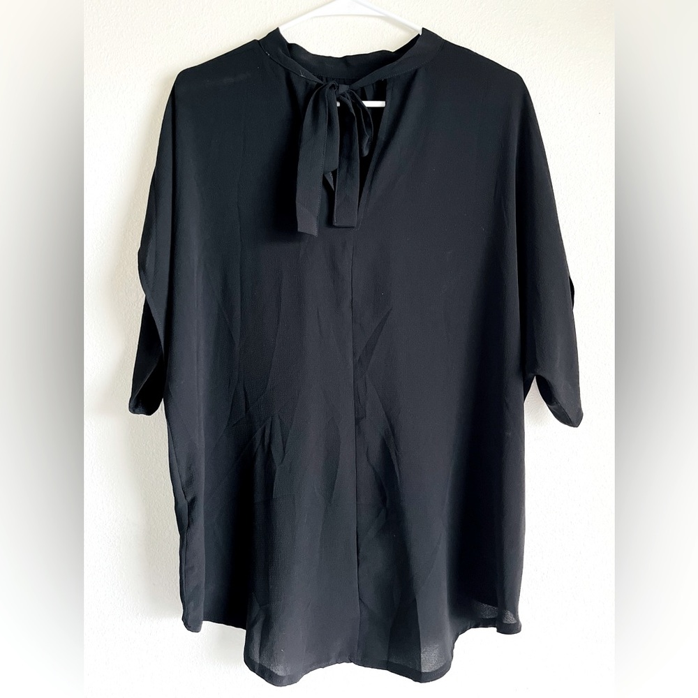 Sheer lightweight women’s top with front tie. Black, size L.